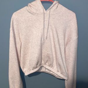 Light pink divided cropped sweatshirt